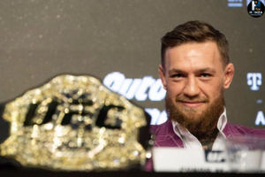 Conor McGregor and Max Holloway facing off ahead of a potential UFC 329 main event.