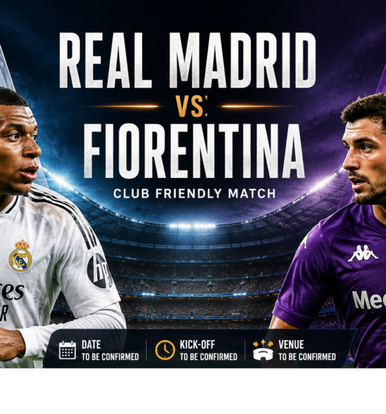 Real Madrid vs Fiorentina players battling for the ball during a floodlit football match preview in a packed stadium.